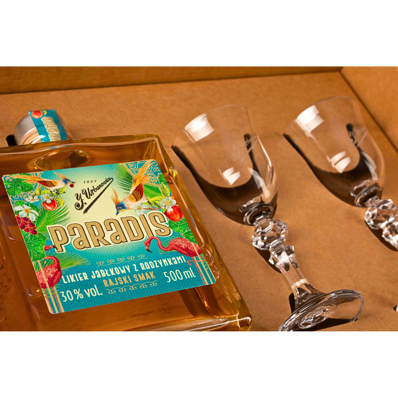 Zestaw prezentowy J. Urbanowicz Paradis 0,5 l 30% – rzemieślniczy likier jabłkowo-rodzynkowy z dwoma kieliszkami firmowymi w eleganckim boxie.